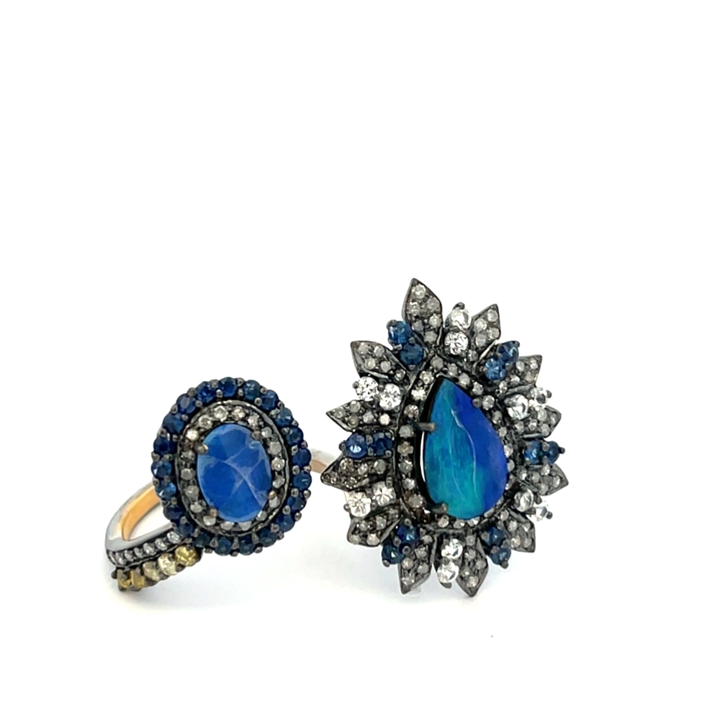 BLACKED GOLD RING K18 WITH DIAMONDS, SAPPHIRES AND OPAL