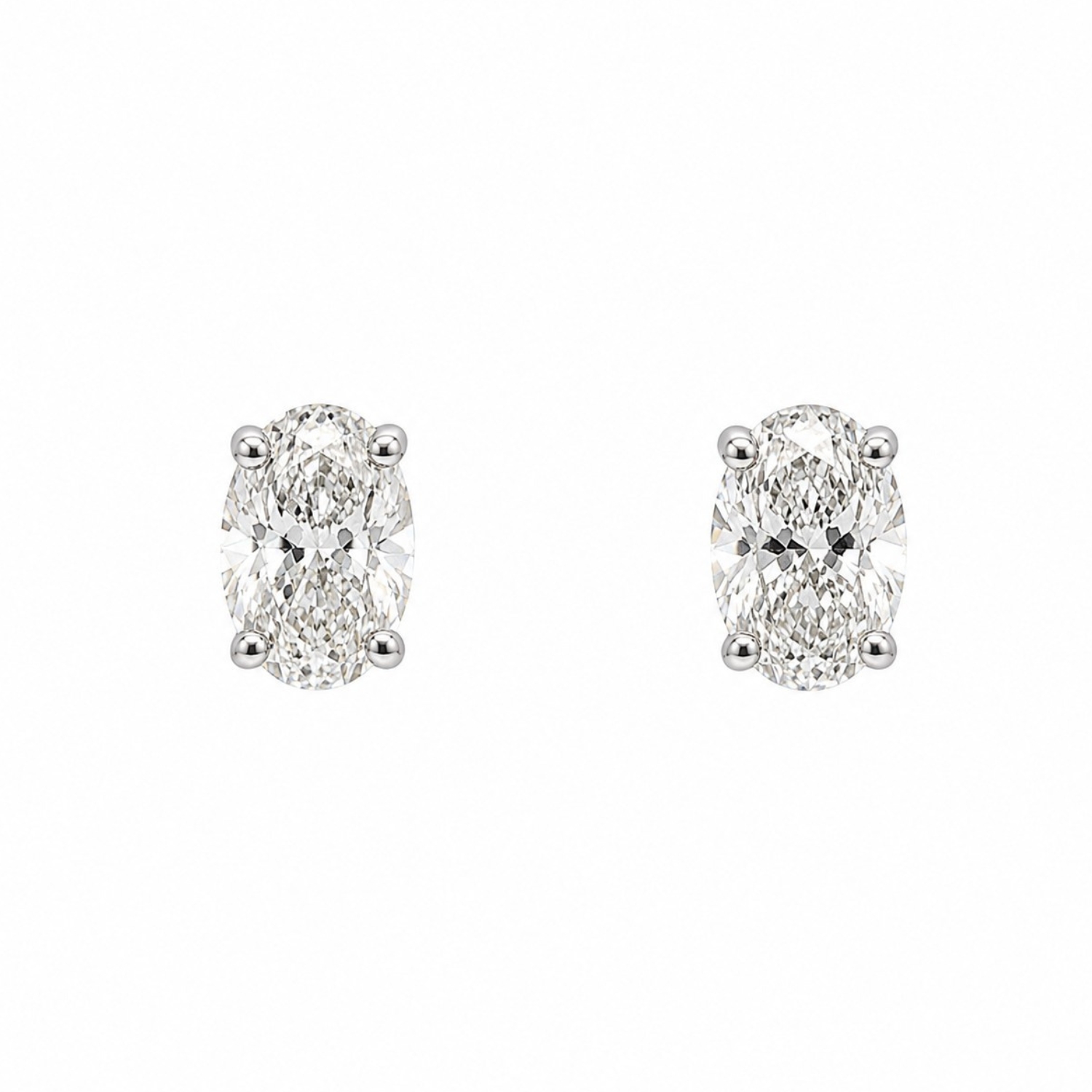 K18 WHITE GOLD SOLITAIRE EARRINGS WITH OVAL DIAMONDS